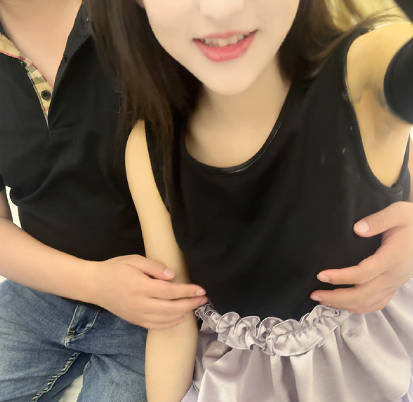 A stunningly beautiful young woman, her cousin, was being played with in a 3P encounter, moaning and whimpering as she was being fucked. madou